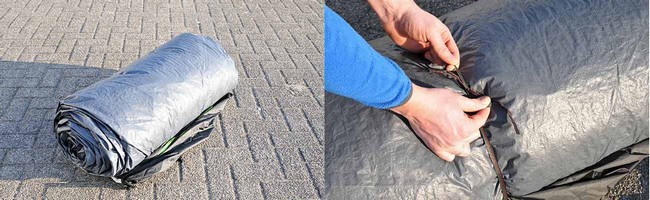 Zusammengerolltes Zelt mit Seil